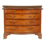 A FINE GEORGE III LOW WAISTED MAHOGANY SERPENTINE CHEST OF DRAWERS