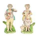 A PAIR OF 18TH CENTURY DERBY SHEPHERD BOY AND SHEPHERDESS FIGURES