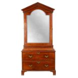 A FINE GEORGE II FIGURED MAHOGANY ARCHITECTURAL SECRETAIRE CABINET IN THE MANNER OF JOHN CHANNON