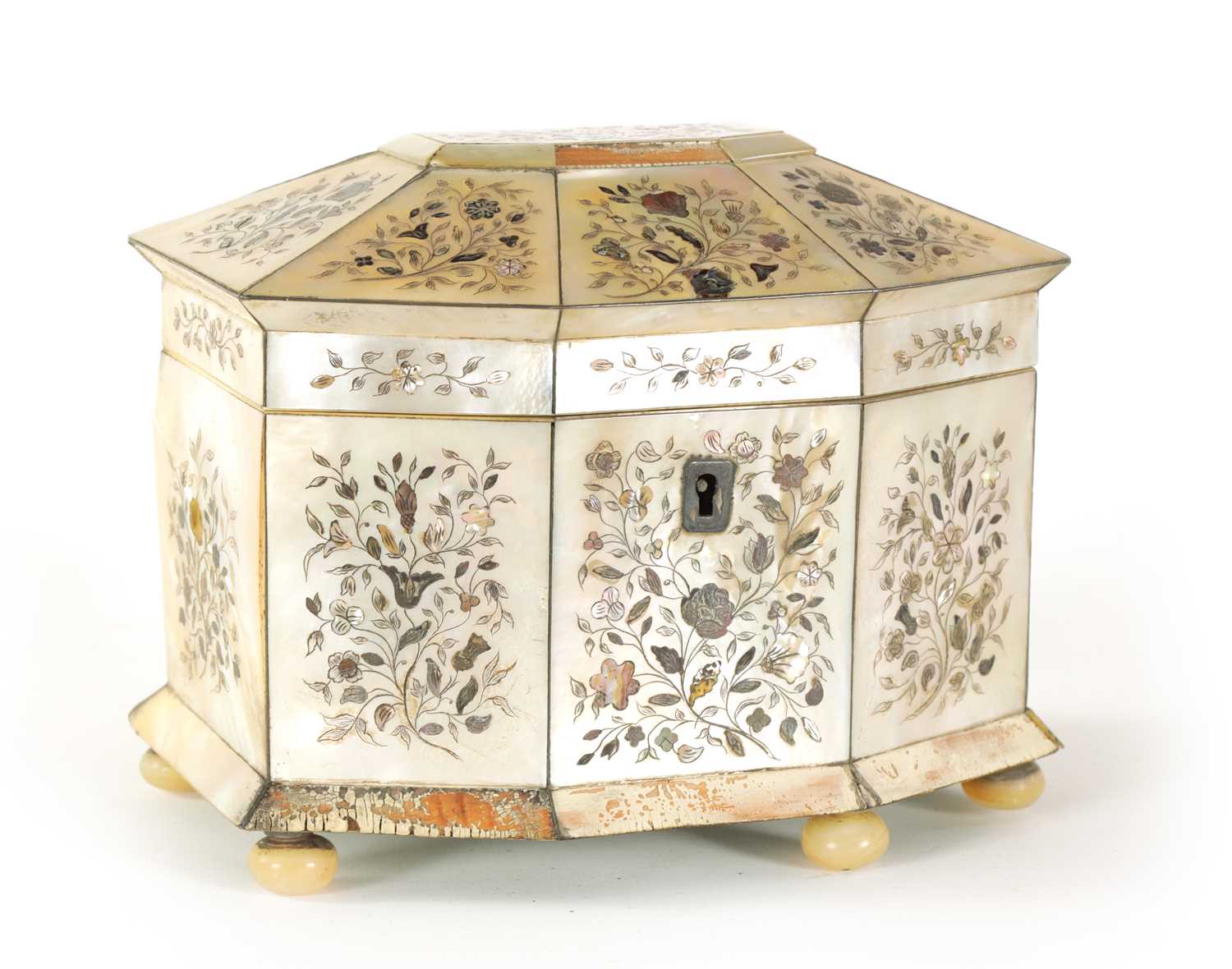 A 19TH CENTURY INLAID MOTHER OF PEARL TEA CADDY WITH CANTED ANGLED FRONT