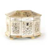 A 19TH CENTURY INLAID MOTHER OF PEARL TEA CADDY WITH CANTED ANGLED FRONT