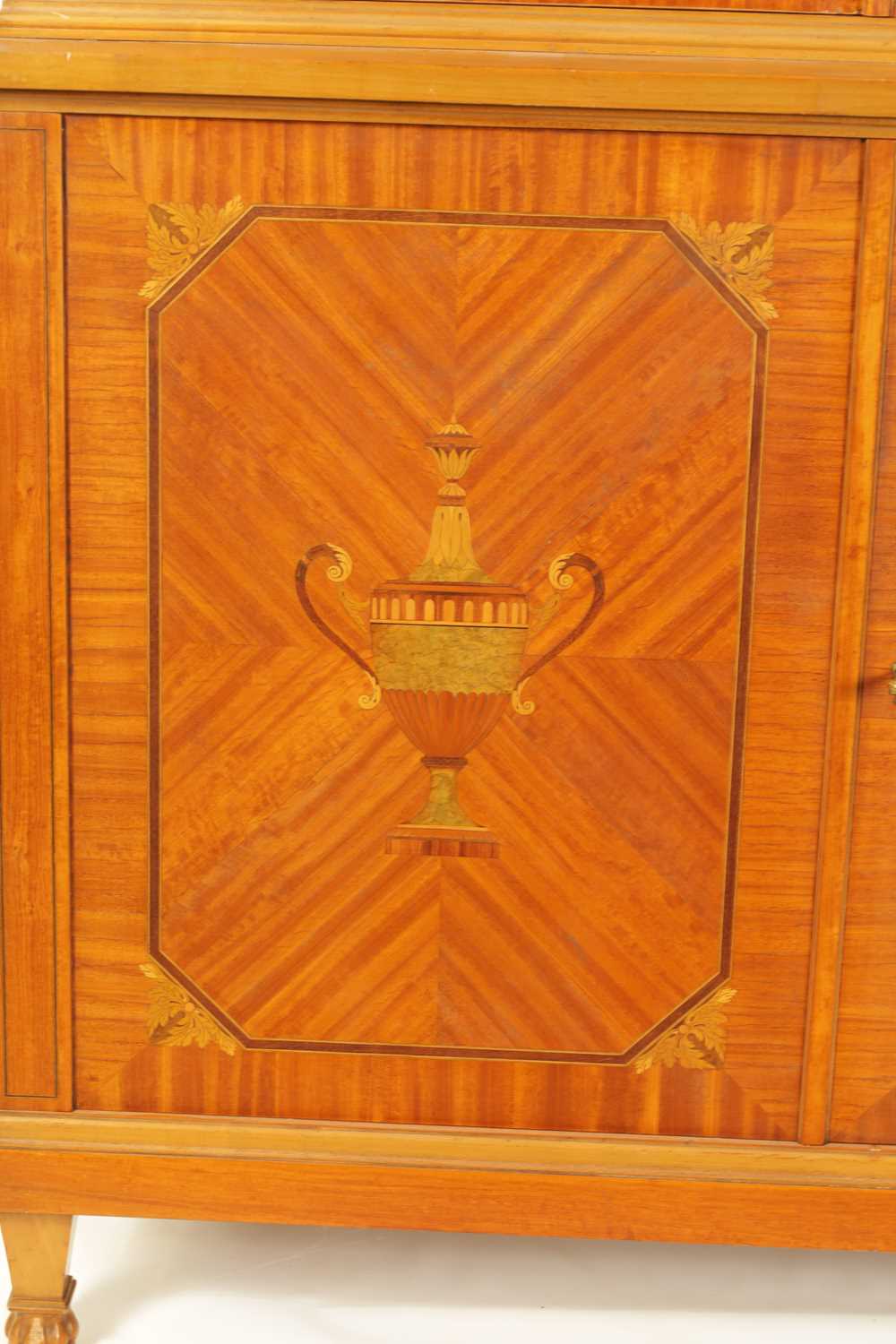 MAPLE & CO. A PAIR OF EDWARDIAN FIGURED SATINWOOD AND MARQUETRY INLAID GLAZED BOOKCASES - Image 4 of 10