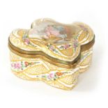 A MID 18TH CENTURY FRENCH SERVES PORCELAIN LEAF SHAPED LIDDED DRESSING TABLE BOX
