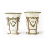 AN UNUSUAL NEAR PAIR OF 19TH CENTURY WEDGWOOD JASPERWARE FLARED FOOTED VASES