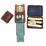 TWO LATE 19TH CENTURY TRAVELLING KNIFE, FORK AND SPOON SETS