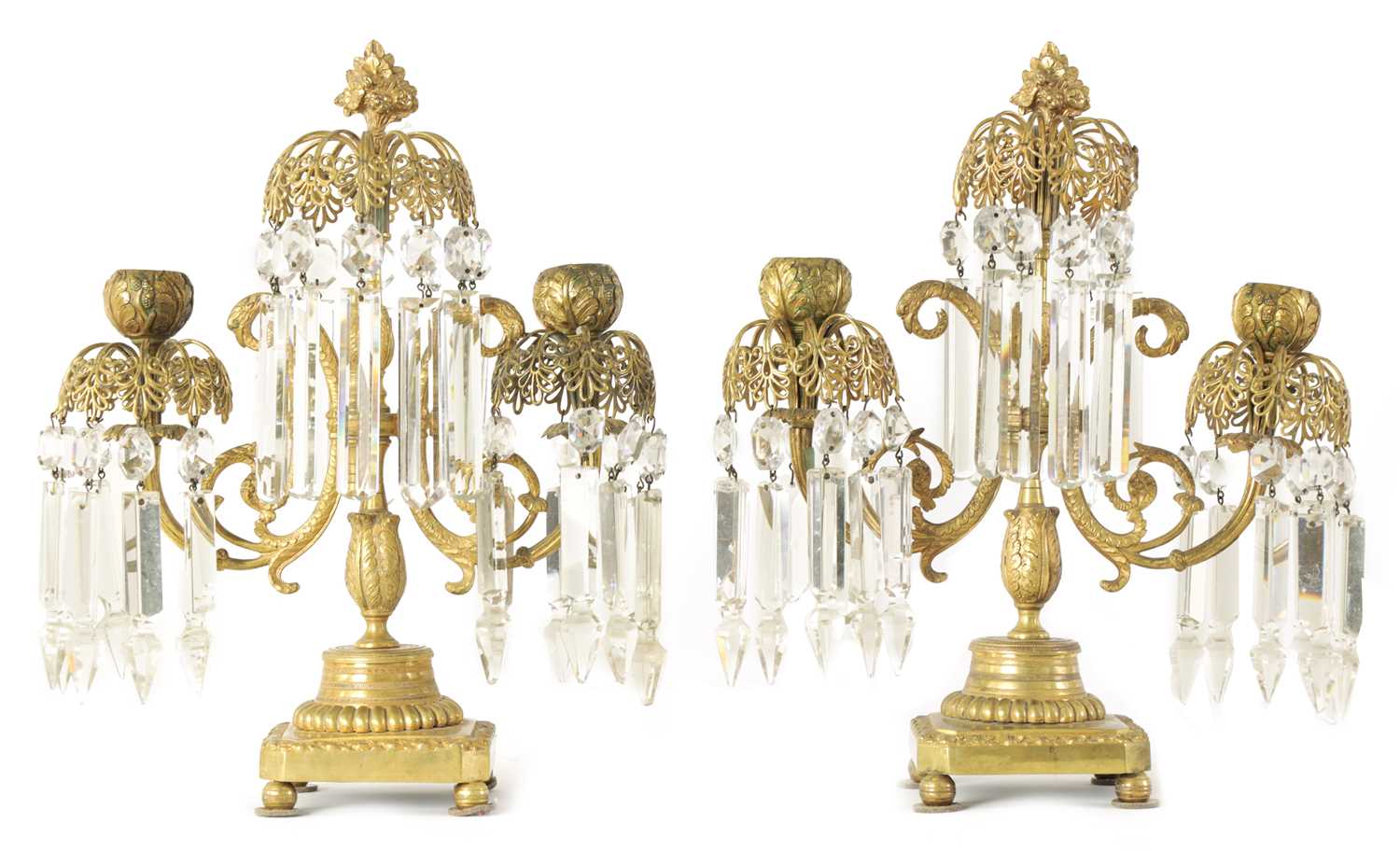 A PAIR OF 19TH CENTURY BRASS AND CUT GLASS CANDELABRA
