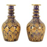 A LARGE PAIR OF 19TH CENTURY BOHEMIAN CUT GILT AND BRISTOL BLUE SERVING BOTTLES