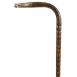 AN EARLY 20TH CENTURY FAUX BAMBOO HAREWOOD SILVER TOPPED WALKING STICK