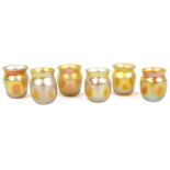 A SET OF SIX LOUIS COMFORT TIFFANY IRIDESCENT LIQUOR GLASSES