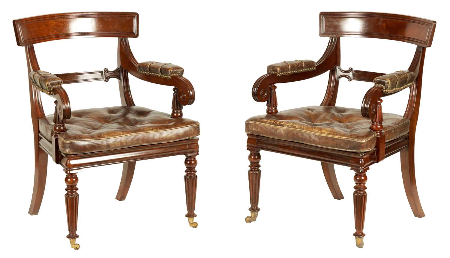 A GOOD PAIR OF REGENCY STYLE MAHOGANY DESK CHAIRS IN THE MANNER OF GILLOWS