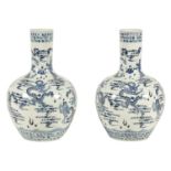 A LARGE PAIR OF LATE 19TH CENTURY CHINESE BLUE AND WHITE BOTTLE NECK VASES