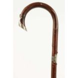 AN EARLY 20TH CENTURY SILVER MOUNTED WALKING STICK