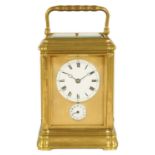 A 19TH CENTURY FRENCH GILT BRASS GORGE CASED REPEATING CARRIAGE CLOCK