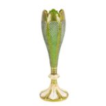 A 19TH CENTURY GREEN GLASS AND WHITE OVERLAY GILT VASE