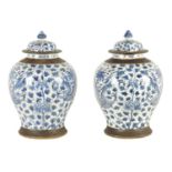 A LARGE PAIR OF 19TH CENTURY CHINESE BLUE AND WHITE CRACKLE GLAZE SHOULDERED VASES AND COVERS