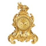 AN EARLY 18TH CENTURY FRENCH ORMOLU ROCOCO MANTEL CLOCK