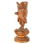 A 19TH CENTURY BLACK FOREST CARVED CIGAR STAND MODELLED AS A FOX