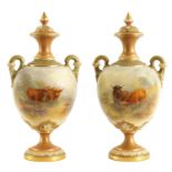 HARRY STINTON. A FINE PAIR OF ROYAL WORCESTER OVOID PEDESTAL CABINET VASES AND COVERS