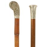 TWO LATE 19TH CENTURY SILVER TOPPED WALKING STICKS