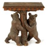 A FINE 19TH CENTURY BLACK FOREST CARVED LINDEN WOOD DOUBLE BEAR OCCASIONAL TABLE / STOOL