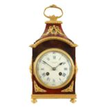 A LATE 19TH CENTURY TORTOISESHELL AND ORMOLU MOUNTED FRENCH EIGHT-DAY MANTEL CLOCK