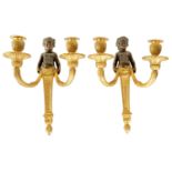 A PAIR OF 19TH CENTURY FRENCH BRONZE AND ORMOLU TWO BRANCH FIGURAL CANDELABRA