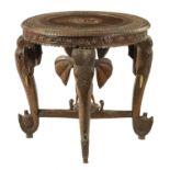 A LATE 19TH CENTURY CARVED INDIAN ELEPHANT TABLE