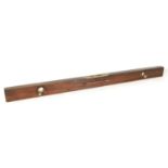 A 19TH CENTURY BRASS TIPPED ROSEWOOD SPRIRT LEVAL