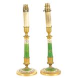A PAIR OF EARLY 19TH CENTURY FRENCH EMPIRE ORMOLU MOUNTED GREEN PORCELAIN CANDLESTICKS