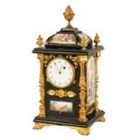 A LATE 19TH CENTURY AUSTRIAN VIENNESE EBONISED AND ENAMEL MANTEL CLOCK