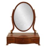 A GEORGE III BOX-WOOD MAHOGNAY SERPENTINE DRESSING TABLE MIRROR