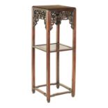 A 19TH CENTURY CHINESE HARDWOOD TALL JARDINIERE STAND