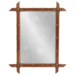 A 19TH CENTURY FAUX BAMBOO FRAMED HANGING MIRROR