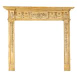 AN 18TH CENTURY CARVED PINE ADAM-STYLE FIRE SURROUND