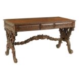 A REGENCY ANGLO INDIAN CARVED HARDWOOD LIBRARY TABLE
