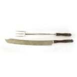 A RARE GIANT PAIR OF LATE REGENCY EXHIBITION CARVING KNIFE AND FORK SET