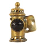 A MINIATURE BRASS MODEL OF A GAS CAR LAMP