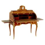 A 19TH CENTURY LOUIS XVI STYLE ORMOLU MOUNTED KINGWOOD AND MARQUETRY BUREAU A CYLINDRE
