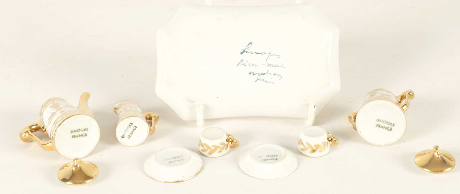 AN EARLY 20TH CENTURY MINIATURE LIMOGES PORCELAIN FRENCH NAPOLEON TEA SERVICE - Image 3 of 8