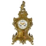 A LATE 19TH CENTURY FRENCH LACQUERED AND BRASS MOUNTED MANTEL CLOCK