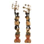 A PAIR OF 20TH CENTURY CARVED POLYCHROME BLACKAMOOR CARVED CANDELABRA