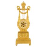 GUILET, PARIS. AN EARLY 19TH CENTURY FRENCH ORMOLU LYRE-SHAPED MANTEL CLOCK