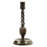 AN 18TH CENTURY MAHOGANY CANDLESTICK