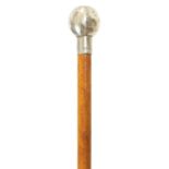 AN EARLY 20TH CENTURY SILVER TOPPED MALACA CANE SWAGGER STICK