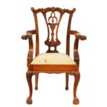 A 20TH CENTURY MAHOGANY CHIPPENDALE STYLE CHILDS ARMCHAIR