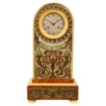 AN UNUSUAL FRENCH EMPIRE FIGURED MAHOGANY AND ORMOLU MANTEL CLOCK