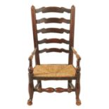 A 19TH CENTURY ASH AND ELM LADDER BACK CHILDS CHAIR