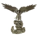 A 19TH CENTURY CHINESE PATINATED BRONZE SCULPTURE OF AN EAGLE