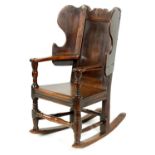 A RARE EARLY 18TH CENTURY JOINED OAK CHILD'S LAMBING CHAIR