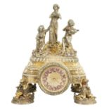 A FINE 19TH CENTURY AUSTRIAN SILVER GILT AND JEWELLED FIGURAL MANTEL/BOUDOIR CLOCK